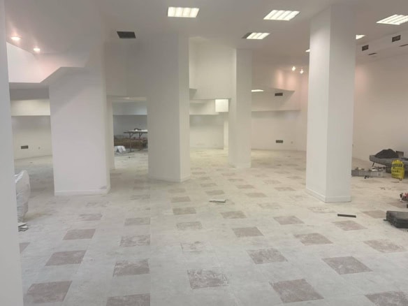 Shop for sale in Sofia, center. White walls with tile floor, and luminescent lighting