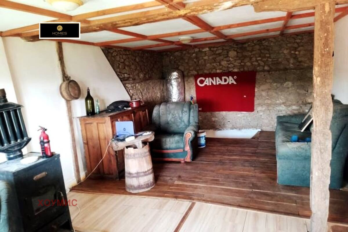 Interior space with wooden beams and traditional Canadian barrel