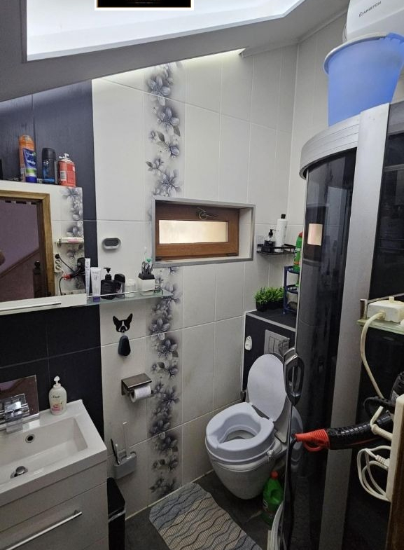 Small modern bathroom with white tiles