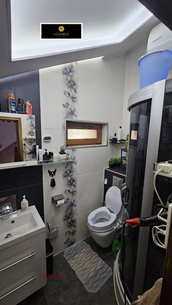 Small modern bathroom with white tiles