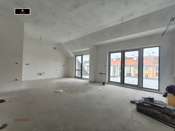 Spacious living room with large windows terrace