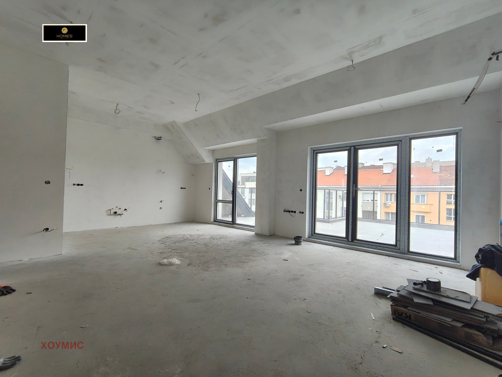 Spacious living room with large windows terrace