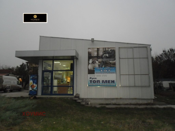Metal building shop with entrance and storefront