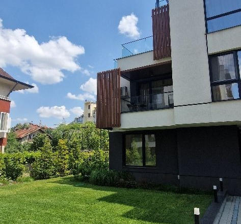 Modern villa with garden and terrace, natural daylight