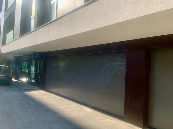 Garage 19 sqm for Sale in Sofia Borovo | Near Entry Barrier 5 Closed garage with brown roller door entrance