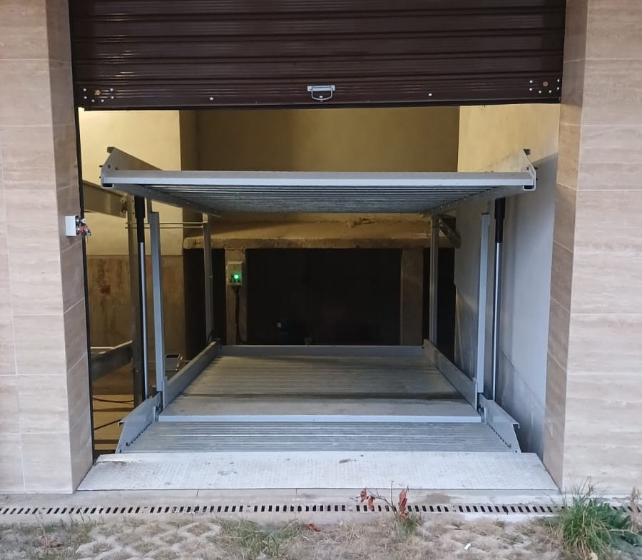 Garage with automatic roller shutter door open