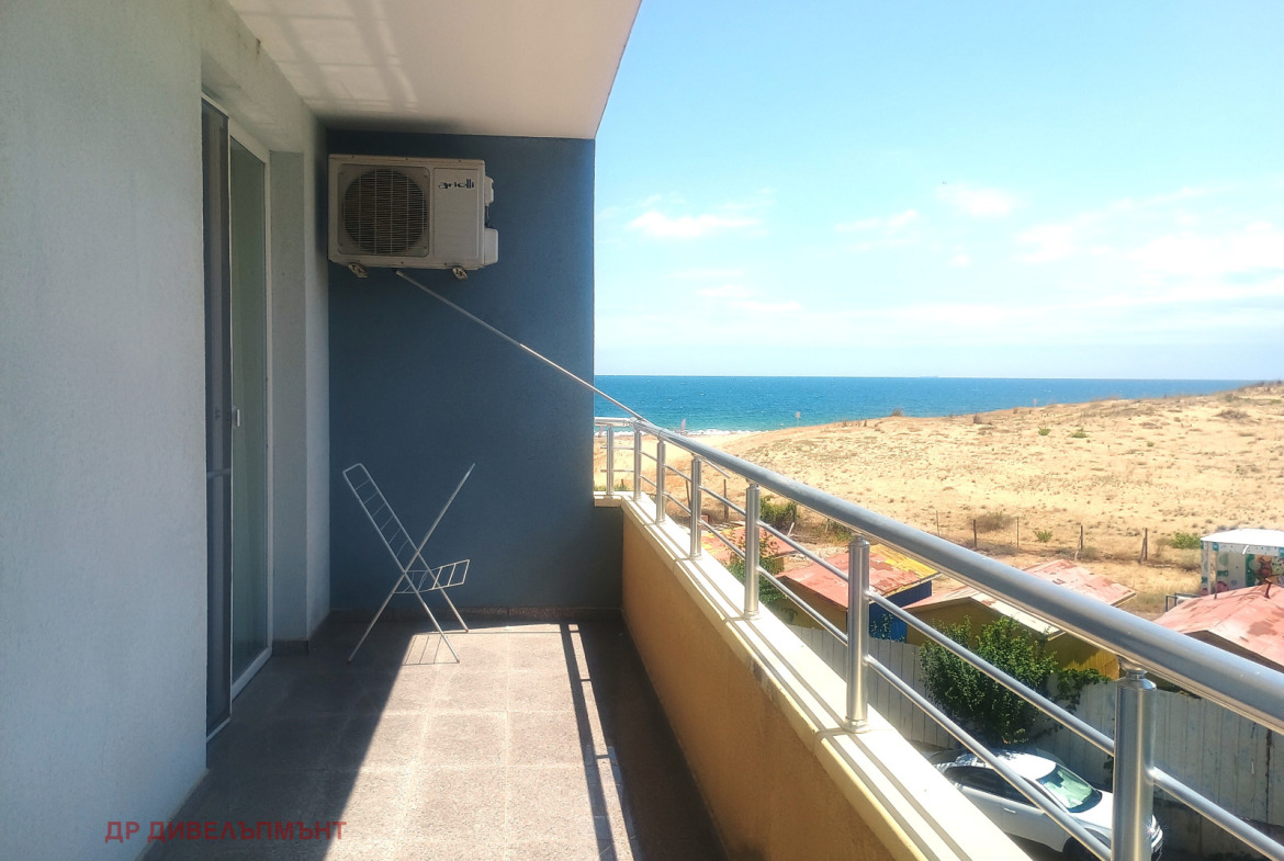 Balcony with sea view and air conditioning unit