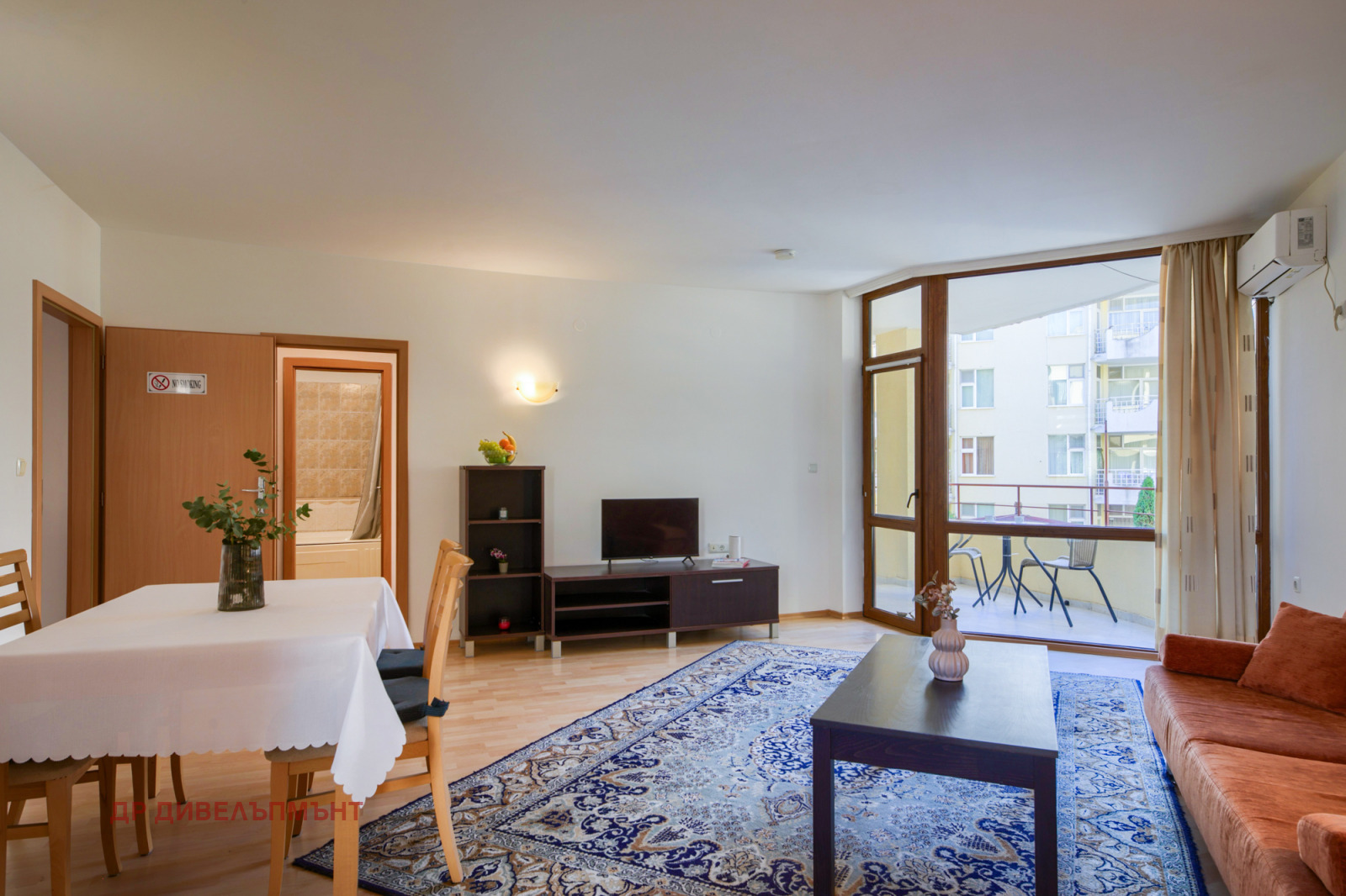 Modern living room with sofa and flat-screen television