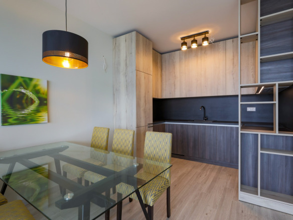 Modern kitchen with bar and yellow chairs