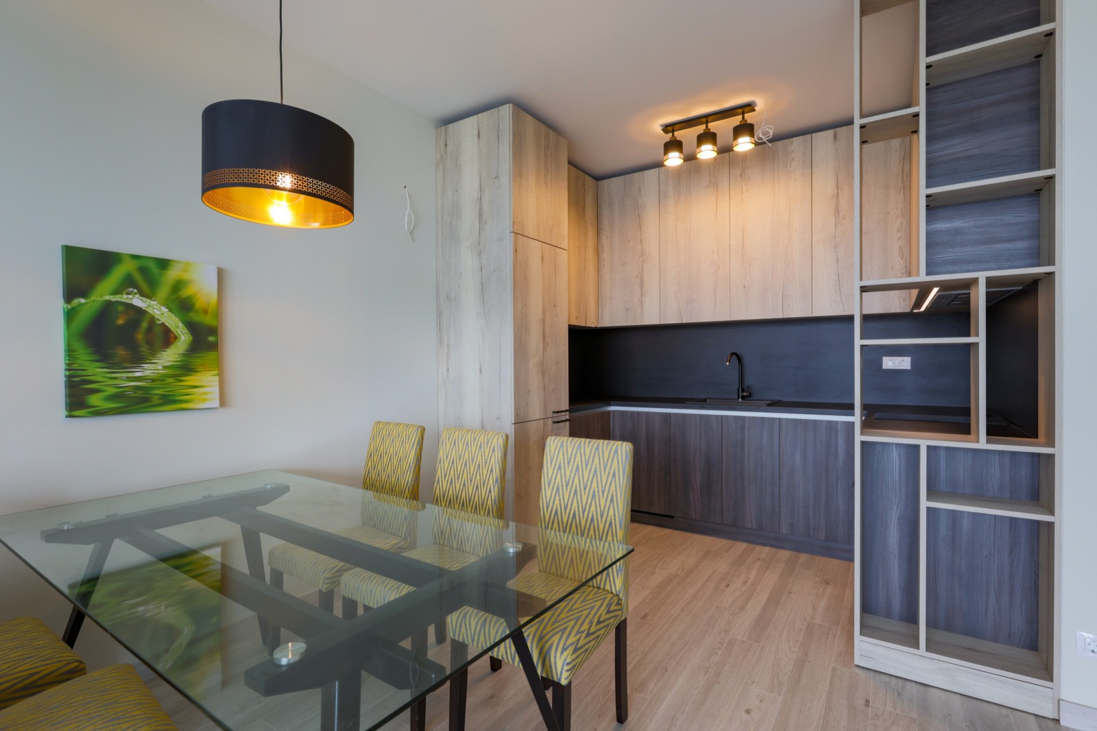 Modern kitchen with bar and yellow chairs