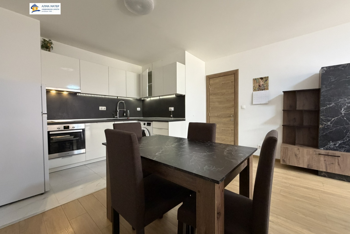 dvustaen-apartament-81-kvm-pod-naem-manastirski-livadi-panoramna-gledka-3 Трапезна маса от дърво с четири кафяви стола