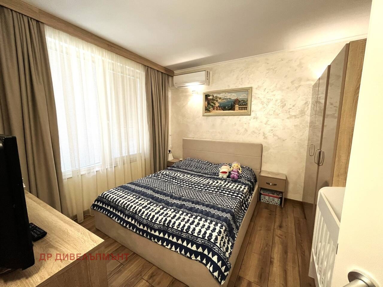 Second bedroom with double bed wardrobe and large window
