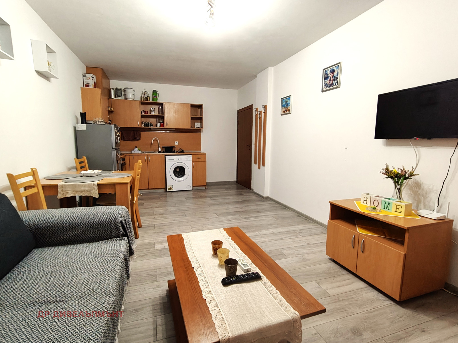 tristaen-apartament-82-kvm-pod-naem-ravda-palm-marina-1 Просторен дневен покой с кухня и трапезария