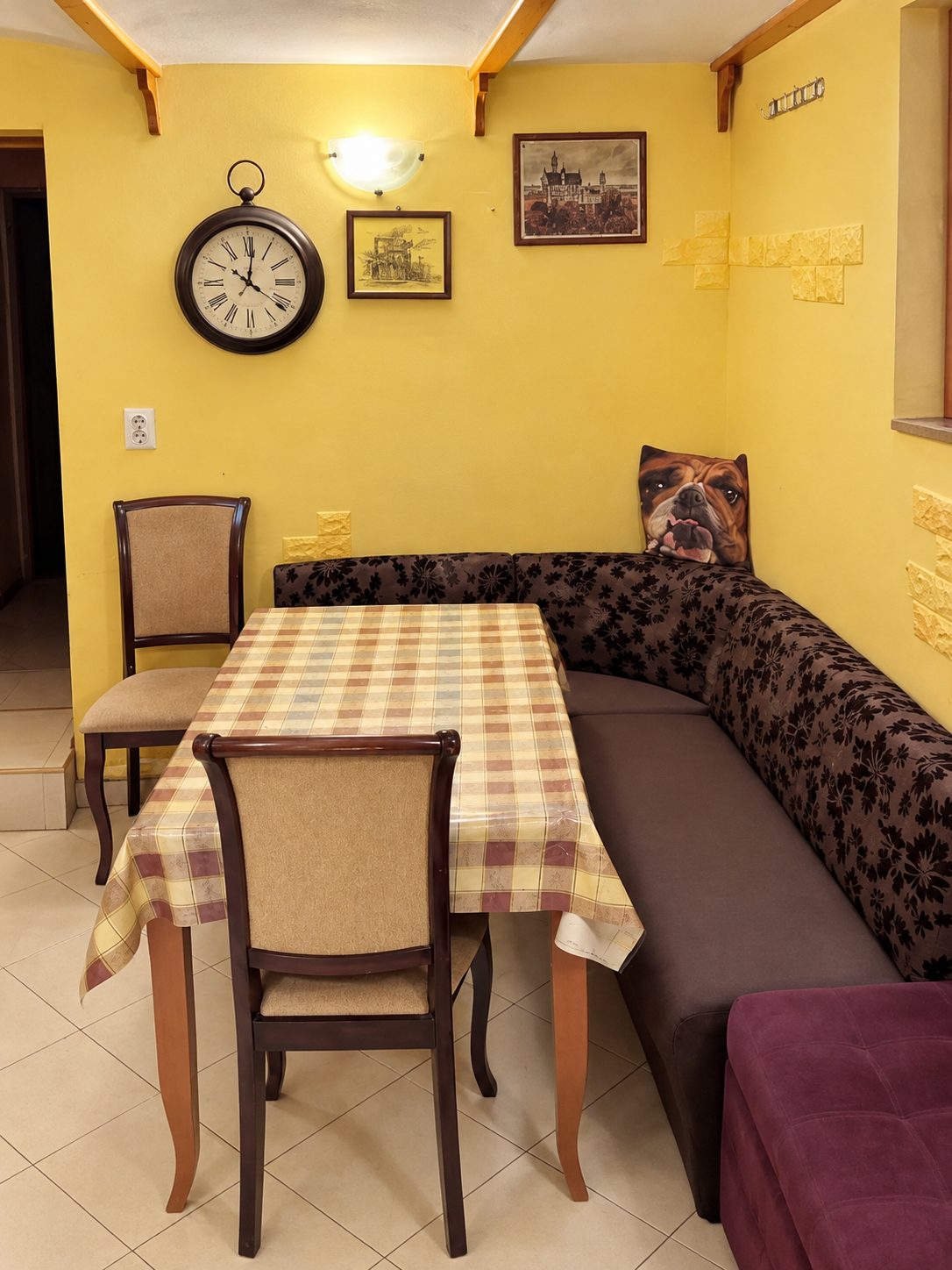 Yellow dining room with table and chairs