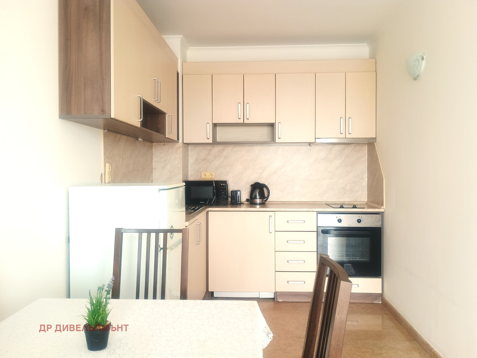 dvustaen-apartament-71-sqm-pod-naem-nesebar-kristal-biych-4 Kitchen from another angle with oven drawers