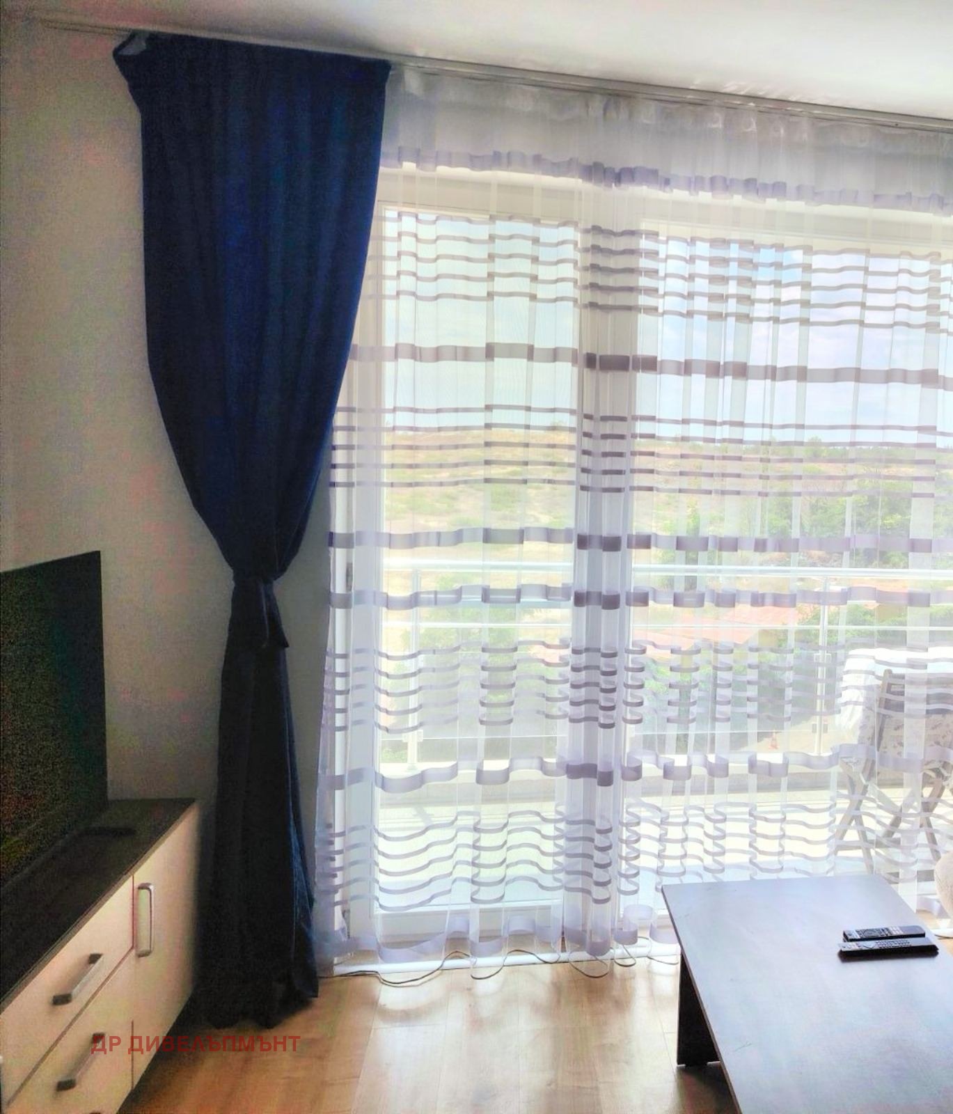 dvustaen-apartament-71-sqm-pod-naem-nesebar-kristal-biych-5 Window with dark curtains and panoramic sea view
