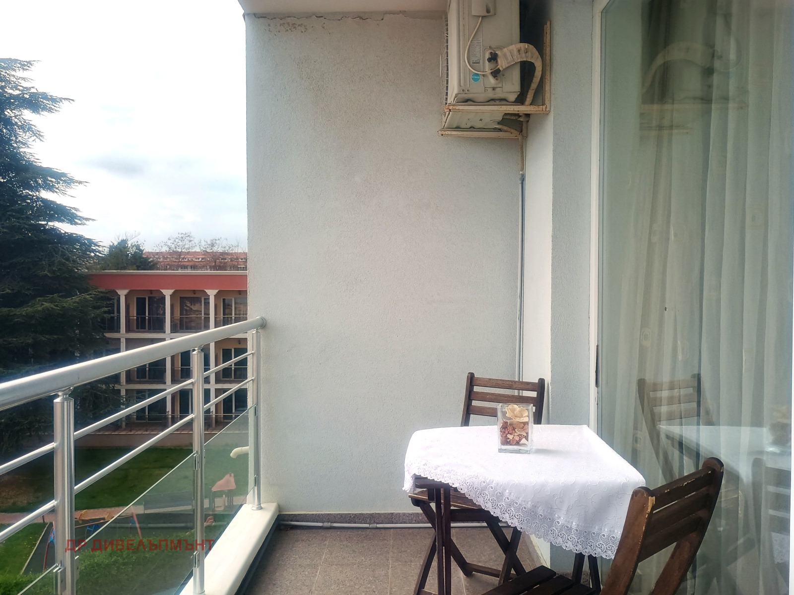 dvustaen-apartament-71-sqm-pod-naem-nesebar-kristal-biych-6 Bedroom with double bed and dark curtains