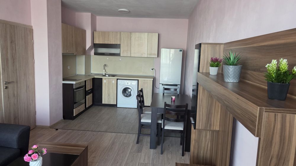 dvustaen-apartament-80-kvm-pod-naem-sofia-posleden-etazh-panoramna-terasa-2 Kitchen with white appliances, wooden cabinets and washing machine