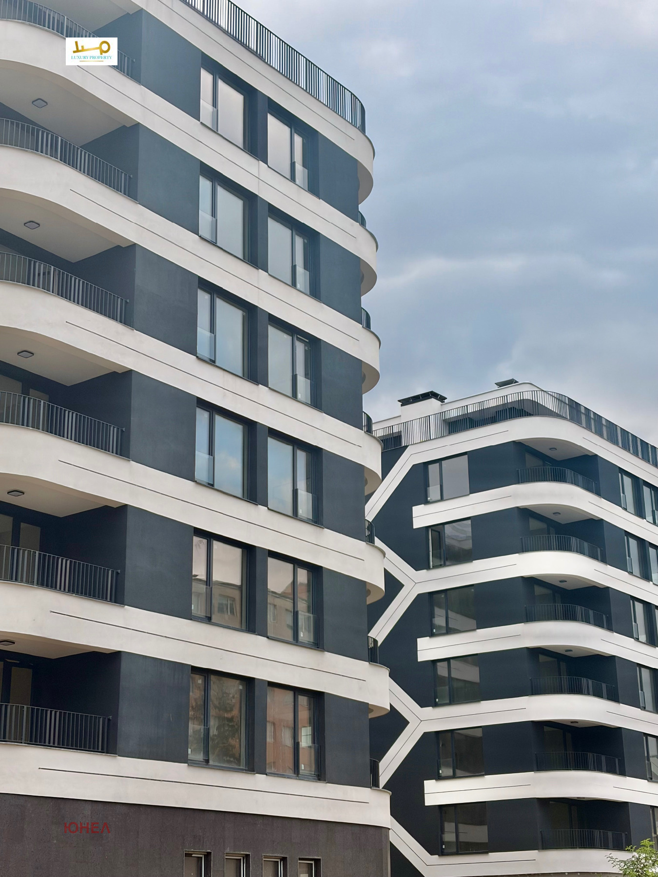 Modern residential building with curved balconies design