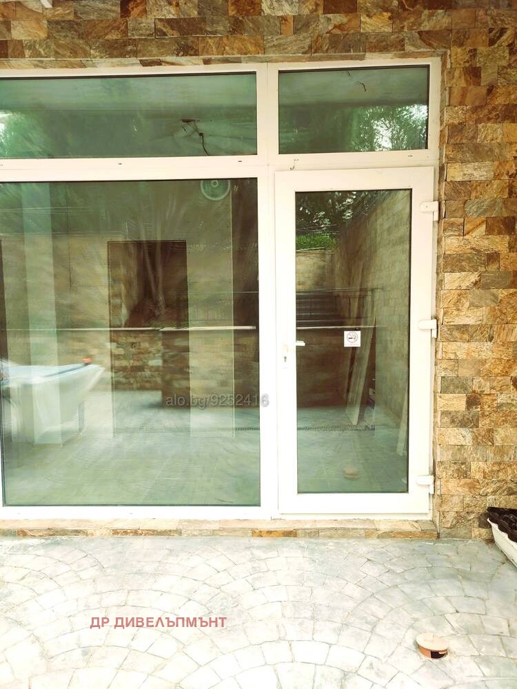 Shop storefront with double doors and glass windows