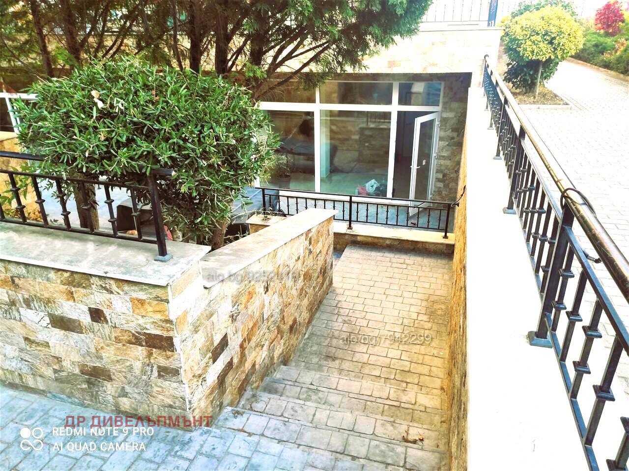 Exterior entrance with stone walls in complex