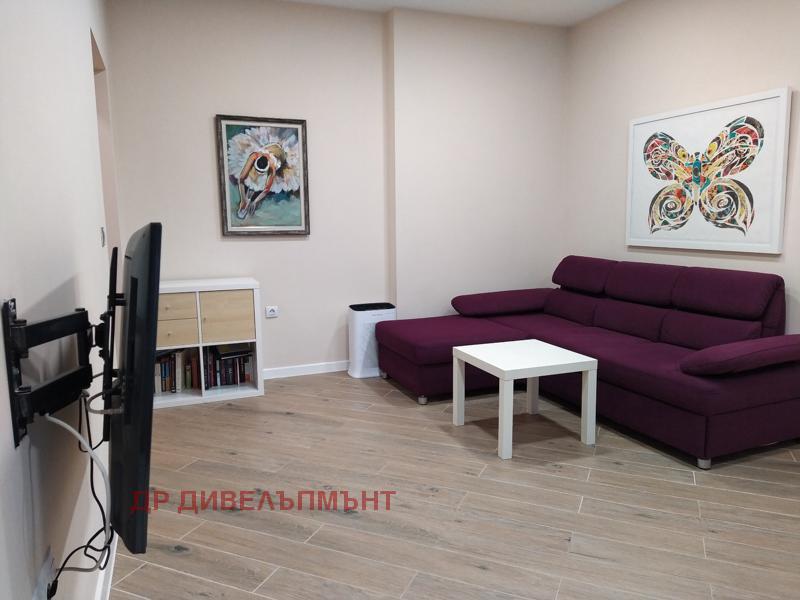 tristaen-apartament-99-kvm-pod-naem-yavorov-osnovno-renoviran-3 Living room with television, sofa and dining table