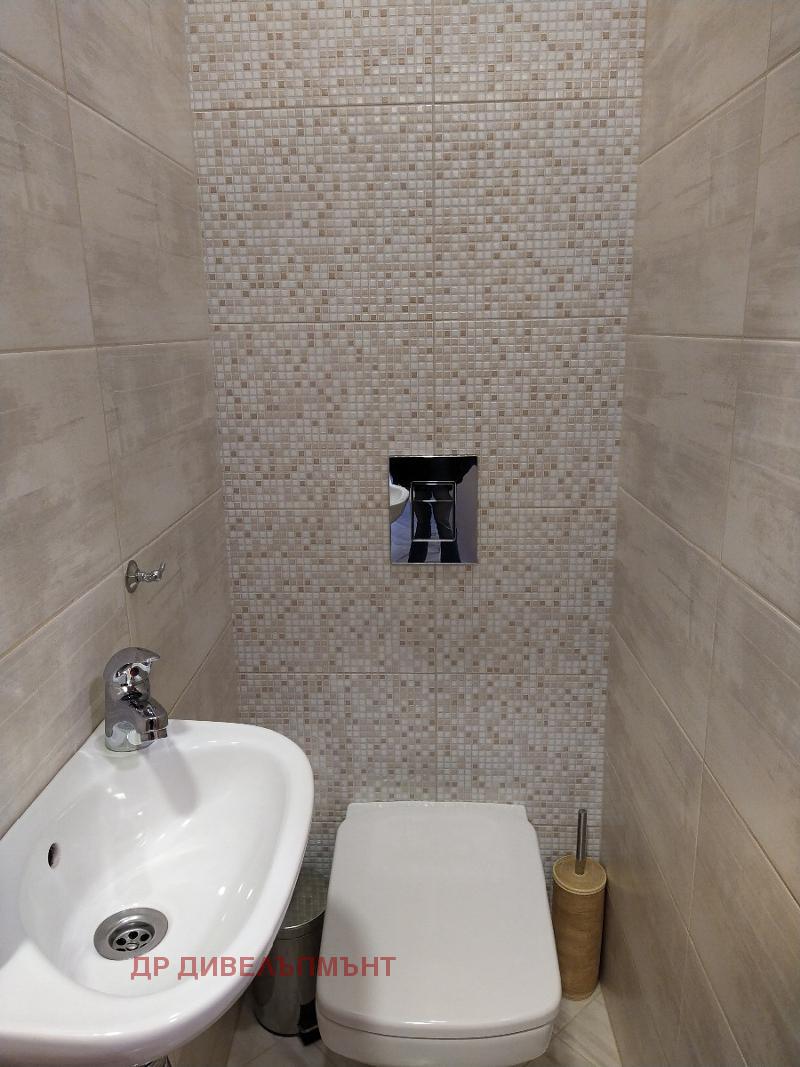 Bathroom with shower cabin and tiles