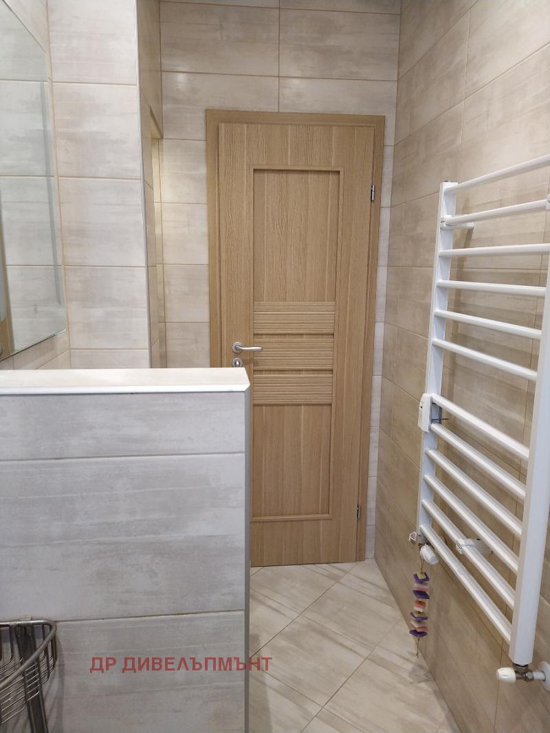 Luxury bathroom with shower and mosaic tiles