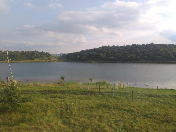 Land Plot in Arbanas near lake with wooded hills beyond